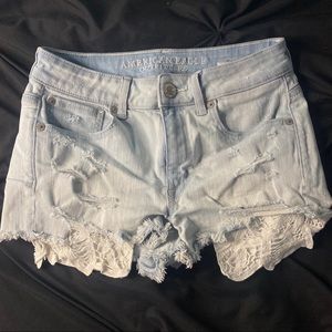 ripped shorts w/ showing pockets